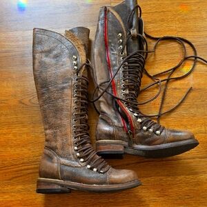 Freebird Roman Rustic Brown Lace-Up Boots with Vibrant Red Accent